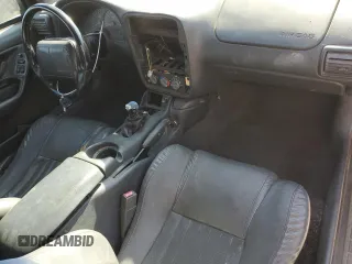 1997 Chevrolet Camaro Z28 z VIN 2G1FP22P1V2130346, wystawiony jako Copart lot #77366774 z przebiegiem 193 815 mil mil oraz Szkoda całkowita • Salvage title. Historia ofert i sprzedaży dostępna na DreamBid. Obrazek 8.