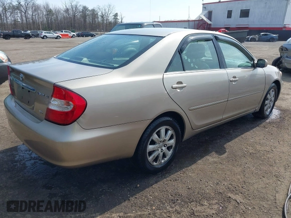 2004 Toyota Camry LE with VIN 4T1BF30K94U587836, listed as a IAAI auction lot 41714277 with 211,893 mi miles and . Bid and sale history available at carsss.com. Image 4.