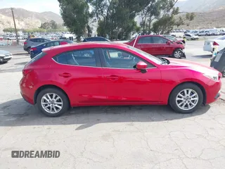 2015 Mazda 3 i Touring with VIN JM1BM1L75F1262109, listed as a IAAI auction lot 42232811 with 53,744 mi miles and . Bid and sale history available at DreamBid. Image 13.