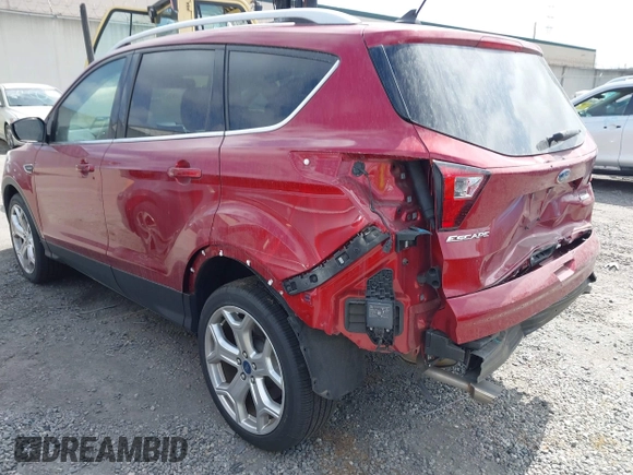 2019 Ford Escape Titanium with VIN 1FMCU0J96KUB79330, listed as a IAAI auction lot 42018346 with 35,500 mi miles and . Bid and sale history available at DreamBid. Image 3.