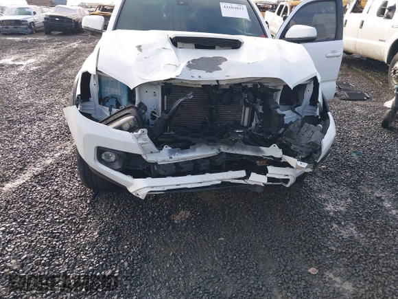 2021 Toyota Tacoma SR z VIN 3TMCZ5AN2MM426723, wystawiony jako IAAI lot #41604033 z przebiegiem 46 522 mil mil oraz . Historia ofert i sprzedaży dostępna na DreamBid. Obrazek 6.