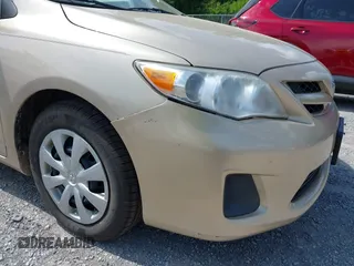 2011 Toyota Corolla L with VIN 2T1BU4EEXBC574462, listed as a IAAI auction lot 42201077 with 222,929 mi miles and . Bid and sale history available at DreamBid. Image 15.