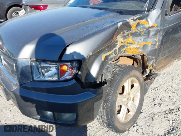 2010 Honda Ridgeline RTL with VIN 5FPYK1F52AB004678, listed as a IAAI auction lot 41661968 with 169,021 mi miles. Bid and sale history available at carsss.com. Image 6.