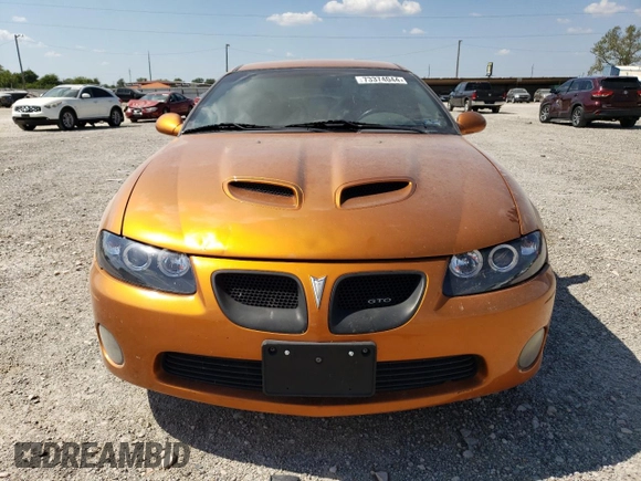 2006 Pontiac GTO z VIN 6G2VX12U76L521089, wystawiony jako Copart lot #73374044 z przebiegiem 87 963 mil mil oraz Szkoda całkowita • Salvage title. Historia ofert i sprzedaży dostępna na DreamBid. Obrazek 5.