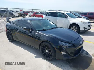 2014 Scion FR-S z VIN JF1ZNAA10E8703778, wystawiony jako IAAI lot #42264695 z przebiegiem 117 889 mil mil oraz . Historia ofert i sprzedaży dostępna na DreamBid. Obrazek 1.