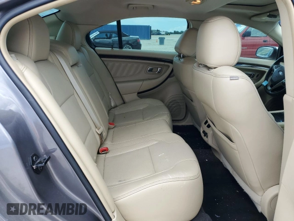 2013 Ford Taurus Limited с VIN 1FAHP2F99DG158940, выставлен на аукционе Copart как лот 66111234 с пробегом 208 640 миль миль и Списание • Salvage title. История ставок и продаж доступна на DreamBid. Изображение 10.