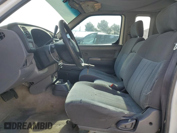 1999 Nissan Frontier XE with VIN 1N6DD26S4XC319806, listed as a Copart auction lot 54233635 with 311,759 mi miles and Clean title. Bid and sale history available at DreamBid. Image 7.