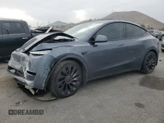 2022 Tesla Model Y Performance with VIN 7SAYGDEF1NF457494, listed as a Copart auction lot 43287315 with 79,855 mi miles and Salvage title. Bid and sale history available at DreamBid. Image 1.