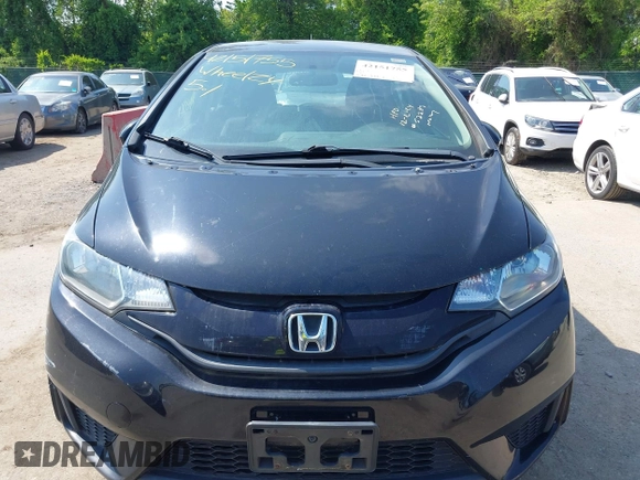 2015 Honda Fit LX z VIN 3HGGK5H51FM724566, wystawiony jako IAAI lot #42151755 z przebiegiem 168 744 mil mil oraz . Historia ofert i sprzedaży dostępna na DreamBid. Obrazek 12.