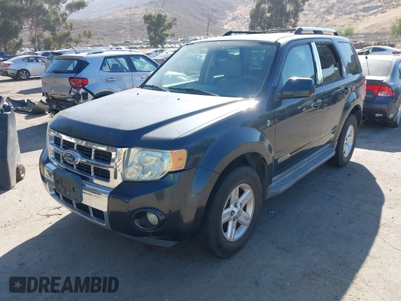 2008 Ford Escape Hybrid z VIN 1FMCU49H08KA21721, wystawiony jako IAAI lot #42493779 z przebiegiem 142 542 mil mil oraz . Historia ofert i sprzedaży dostępna na DreamBid. Obrazek 2.
