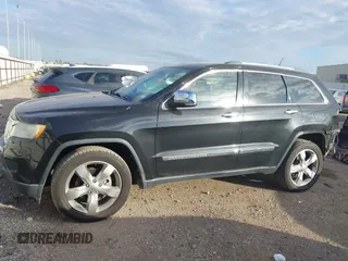 2013 Jeep Grand Cherokee Overland with VIN 1C4RJECT2DC546634, listed as a IAAI auction lot 41180807 with 111,897 mi miles. Bid and sale history available at carsss.com. Image 15.