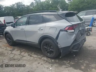 2023 Kia Sportage X-Pro z VIN 5XYK7CAFXPG094501, wystawiony jako Copart lot #56043535 z przebiegiem 19 241 mil mil oraz Szkoda całkowita • Salvage title. Historia ofert i sprzedaży dostępna na DreamBid. Obrazek 2.