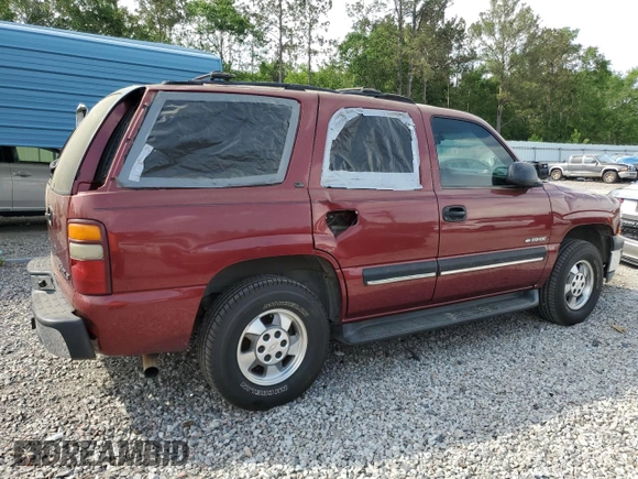 2001 Chevrolet Tahoe LS z VIN 1GNEC13T21J188189, wystawiony jako Copart lot #54394105 z przebiegiem 383 066 mil mil oraz Szkoda całkowita • Salvage title. Historia ofert i sprzedaży dostępna na DreamBid. Obrazek 3.