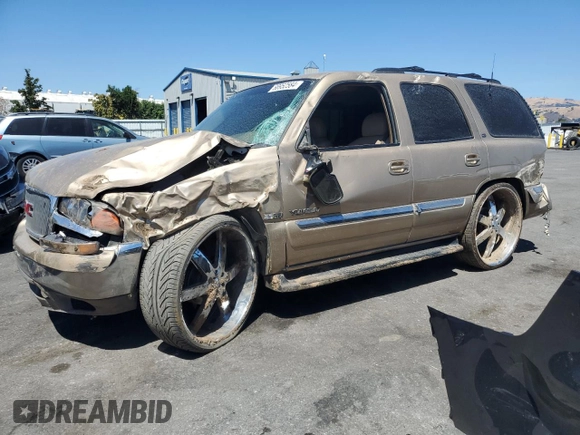 2000 GMC Yukon SLT with VIN 1GKEK13T2YJ131985, listed as a Copart auction lot 68952584 with 210,186 mi miles and Salvage Title. Bid and sale history available at carsss.com. Image 1.
