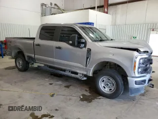 2023 Ford F-250 XL with VIN 1FT8W2BAXPEC99223, listed as a Copart auction lot 56026695 with 33,616 mi miles and Salvage title. Bid and sale history available at DreamBid. Image 4.