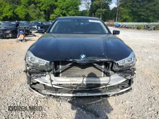 2017 BMW 7 Series 740i with VIN WBA7E2C57HG739482, listed as a Copart auction lot 53652145 with 102,418 mi miles and Salvage title. Bid and sale history available at DreamBid. Image 5.