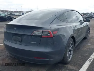 2022 Tesla Model 3 Long Range with VIN 5YJ3E1EB9NF206943, listed as a IAAI auction lot 41911040 with 69,920 mi miles and . Bid and sale history available at DreamBid. Image 4.