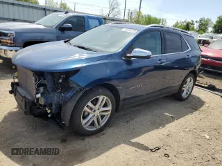 2021 Chevrolet Equinox Premier z VIN 2GNAXXEV0M6133133, wystawiony jako Copart lot #58995075 z przebiegiem 39 599 mil mil oraz Szkoda całkowita • Salvage title. Historia ofert i sprzedaży dostępna na DreamBid. Obrazek 1.