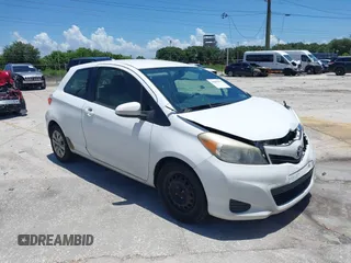 2014 Toyota Yaris L with VIN JTDJTUD32ED588779, listed as a IAAI auction lot 39861997 with 227,114 mi miles. Bid and sale history available at carsss.com. Image 1.