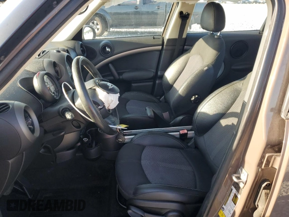 2011 MINI Countryman with VIN WMWZB3C53BWM00724, listed as a Copart auction lot 52293575 with Not Provided miles and Salvage Title. Bid and sale history available at DreamBid. Image 7.