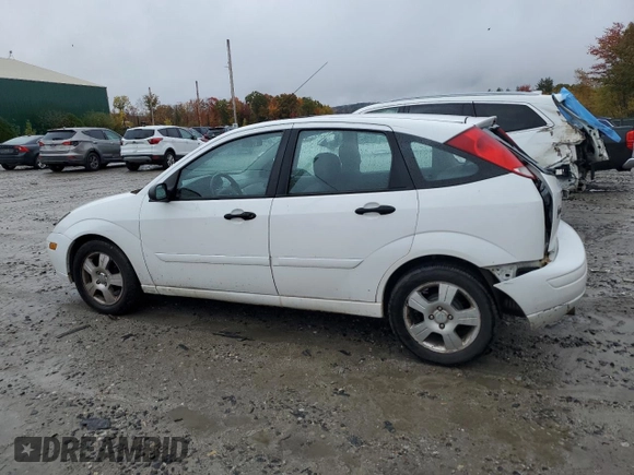2004 Ford Focus with VIN 3FAFP37Z94R101447, listed as a Copart auction lot 74570054 with 162,166 mi miles and Salvage title. Bid and sale history available at DreamBid. Image 2.