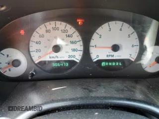 2007 Dodge Grand Caravan SE with VIN 1D4GP24R17B233725, listed as a Copart auction lot 58557245 with 306,473 mi miles and Salvage title. Bid and sale history available at DreamBid. Image 9.