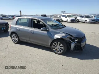 2014 Volkswagen Golf TDI w/Sunroof & Nav z VIN WVWNM7AJ2EW006137, wystawiony jako Copart lot #57031715 z przebiegiem 136 654 mil mil oraz Szkoda całkowita • Salvage title. Historia ofert i sprzedaży dostępna na DreamBid. Obrazek 4.