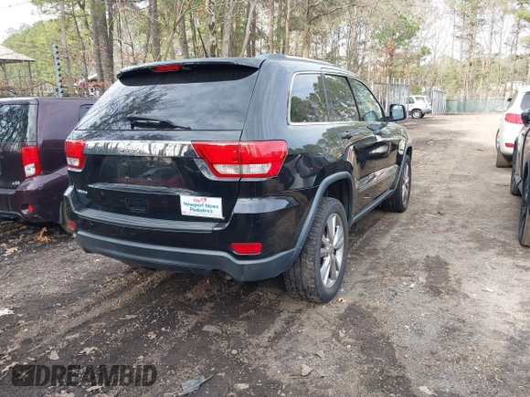 2012 Jeep Grand Cherokee Laredo with VIN 1C4RJEAG0CC316823, listed as a IAAI auction lot 41846479 with 215,317 mi miles. Bid and sale history available at carsss.com. Image 4.