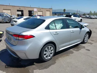 2020 Toyota Corolla LE with VIN JTDEPRAE9LJ020990, listed as a IAAI auction lot 42087507 with 54,314 mi miles and . Bid and sale history available at DreamBid. Image 4.