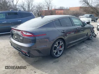 2021 Kia Stinger GT2 with VIN KNAE55LC0M6088347, listed as a IAAI auction lot 41503919 with 113,823 mi miles. Bid and sale history available at carsss.com. Image 4.