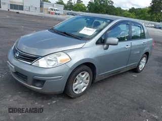 2011 Nissan Versa S with VIN 3N1BC1AP0BL392052, listed as a IAAI auction lot 42383113 with 198,633 mi miles and . Bid and sale history available at DreamBid. Image 2.