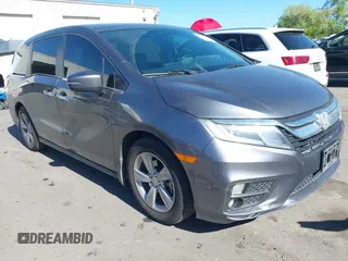 2018 Honda Odyssey EX-L z VIN 5FNRL6H7XJB067694, wystawiony jako IAAI lot #42177338 z przebiegiem 159 670 mil mil oraz . Historia ofert i sprzedaży dostępna na DreamBid. Obrazek 1.
