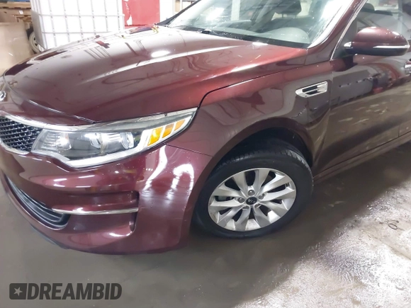 2016 Kia Optima LX with VIN 5XXGT4L3XGG073744, listed as a IAAI auction lot 41586212 with 111,628 mi miles. Bid and sale history available at carsss.com. Image 6.