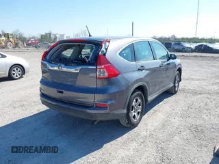 2015 Honda CR-V LX with VIN 2HKRM3H31FH557779, listed as a IAAI auction lot 42098299 with 211,683 mi miles and . Bid and sale history available at carsss.com. Image 4.