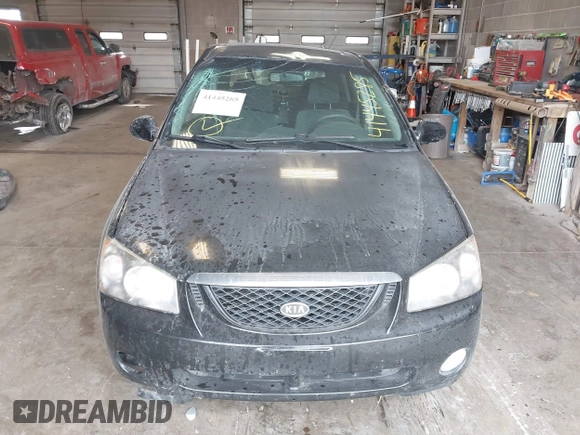 2005 Kia Spectra with VIN KNAFE161255083357, listed as a IAAI auction lot 41445285 with 90,349 mi miles. Bid and sale history available at carsss.com. Image 13.