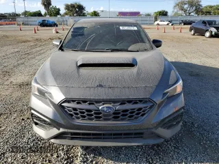 2023 Subaru WRX Premium с VIN JF1VBAH60P8805562, выставлен на аукционе Copart как лот 68148074 с пробегом 26 458 миль миль и Списание • Salvage title. История ставок и продаж доступна на DreamBid. Изображение 5.
