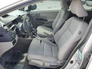 2010 Honda Insight EX with VIN JHMZE2H74AS032878, listed as a Copart auction lot 56230795 with 125,838 mi miles and Clean title. Bid and sale history available at DreamBid. Image 7.