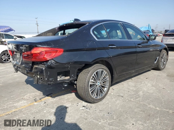 2018 BMW 5 Series 530i with VIN WBAJA5C52JWA36440, listed as a Copart auction lot 63325515 with 8,786 mi miles and Salvage title. Bid and sale history available at DreamBid. Image 3.