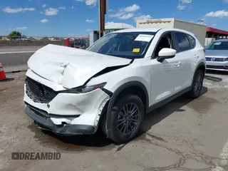 2020 Mazda CX-5 Sport with VIN JM3KFABM1L1752583, listed as a IAAI auction lot 40349125 with 50,134 mi miles. Bid and sale history available at carsss.com. Image 17.