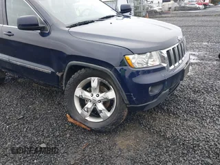 2012 Jeep Grand Cherokee Laredo with VIN 1C4RJFAG9CC220145, listed as a IAAI auction lot 41798457 with 130,603 mi miles. Bid and sale history available at carsss.com. Image 6.