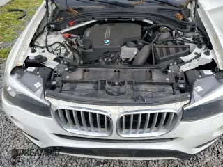 2017 BMW X3 sDrive28i z VIN 5UXWZ7C3XH0V92354, wystawiony jako Copart lot #56659555 z przebiegiem 64 570 mil mil oraz Szkoda całkowita • Salvage title. Historia ofert i sprzedaży dostępna na DreamBid. Obrazek 12.