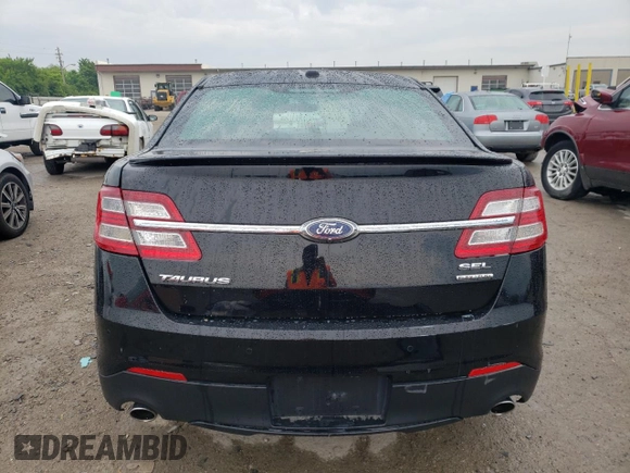 2018 Ford Taurus SEL with VIN 1FAHP2E89JG119639, listed as a Copart auction lot 58686685 with 107,490 mi miles and Salvage title. Bid and sale history available at DreamBid. Image 6.