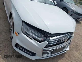 2018 Audi A4 Premium Plus z VIN WAULMAF47JA100901, wystawiony jako IAAI lot #42114793 z przebiegiem 101 899 mil mil oraz . Historia ofert i sprzedaży dostępna na DreamBid. Obrazek 12.