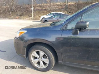 2015 Subaru Forester 2.5i with VIN JF2SJABCXFH599231, listed as a IAAI auction lot 42166220 with 60,409 mi miles and . Bid and sale history available at DreamBid. Image 18.