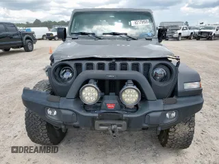 2022 Jeep Wrangler Unlimited Willys Sport with VIN 1C4HJXDMXNW158534, listed as a Copart auction lot 62179995 with 66,947 mi miles and Salvage title. Bid and sale history available at DreamBid. Image 5.