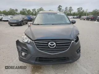 2016 Mazda CX-5 Grand Touring with VIN JM3KE4DY5G0865923, listed as a Copart auction lot 51637115 with 151,174 mi miles and Salvage Title. Bid and sale history available at carsss.com. Image 5.
