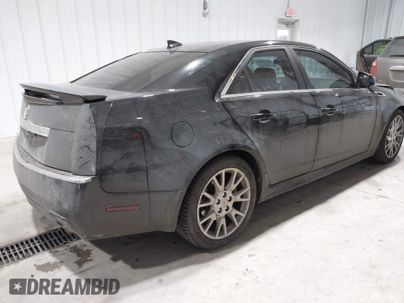 2013 Cadillac CTS Premium z VIN 1G6DS5E34D0103328, wystawiony jako IAAI lot #41501406 z przebiegiem 157 633 mil mil oraz . Historia ofert i sprzedaży dostępna na DreamBid. Obrazek 4.