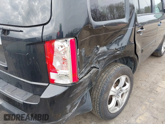 2015 Honda Pilot EX-L z VIN 5FNYF3H57FB019710, wystawiony jako IAAI lot #41553589 z przebiegiem 163 687 mil mil oraz . Historia ofert i sprzedaży dostępna na DreamBid. Obrazek 6.