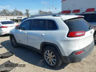 2016 Jeep Cherokee Limited with VIN 1C4PJLDB8GW256788, listed as a IAAI auction lot 41657339 with 104,630 mi miles. Bid and sale history available at carsss.com. Image 3.