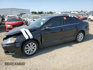 2014 Volkswagen Jetta SE z VIN 3VWD17AJ2EM289589, wystawiony jako Copart lot #59201625 z przebiegiem 76 825 mil mil oraz Szkoda całkowita • Salvage title. Historia ofert i sprzedaży dostępna na DreamBid. Obrazek 1.